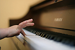 small hand on piano