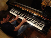  overhead shot young man playing piano